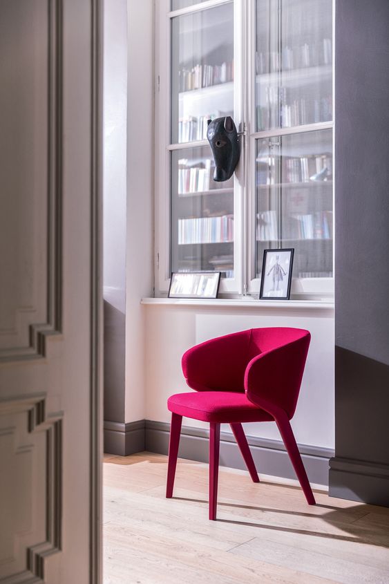 a single magenta chair like this one will make a bold statement and add color to the space easily