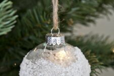42 a frosted Christmas ornament is a beautiful and cool idea to try for a winter wonderland Christmas tree