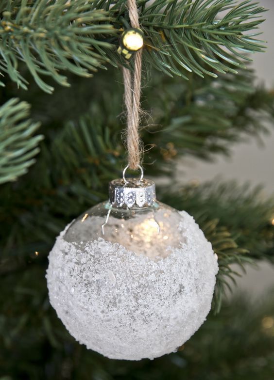 a frosted Christmas ornament is a beautiful and cool idea to try for a winter wonderland Christmas tree