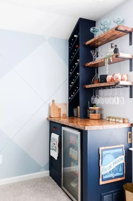 a navy home bar with stained open shelves, a wine cooler and some cabinetry with open storage and not only is a lovely idea for a farmhouse space