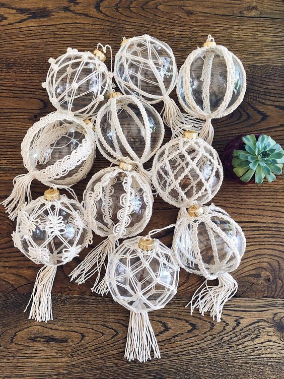 clear glass Christmas ornaments decorated with macrame and tassles are perfect to style your tree boho way