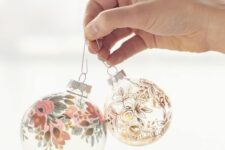 45 clear glass Christmas ornaments decorated with paints – floral patterns here and there