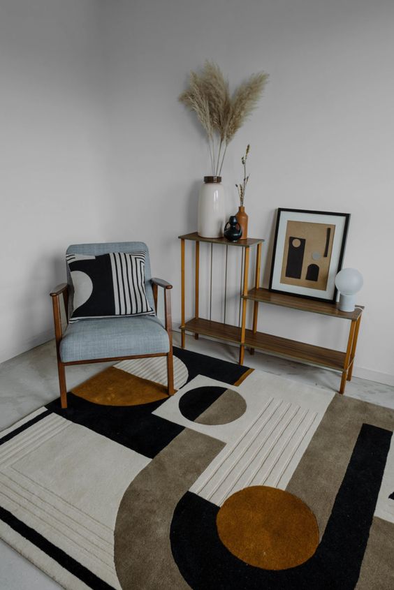 a gorgeous geometric rug like this one will take over the whole space making a statement