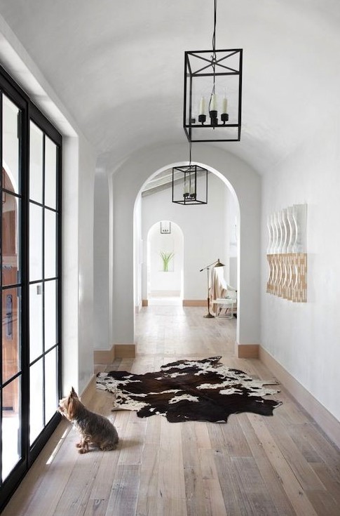 arched doorways make entryways and corridors catchy and chic, add pendant lamps to highlight it