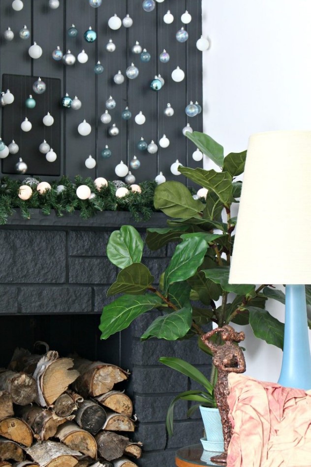 Christmas wall decor with cascading ornaments of light blue, aqua and white color is a gorgeous modern decor idea