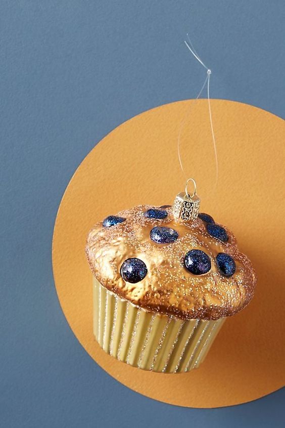 a beautiful and delicious-looking gilded blueberry muffin ornament is a perfect decoration for a Christmas tree