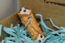 a cannoli Christmas ornament is a creative idea and will be a nice solution for those who have a sweet tooth