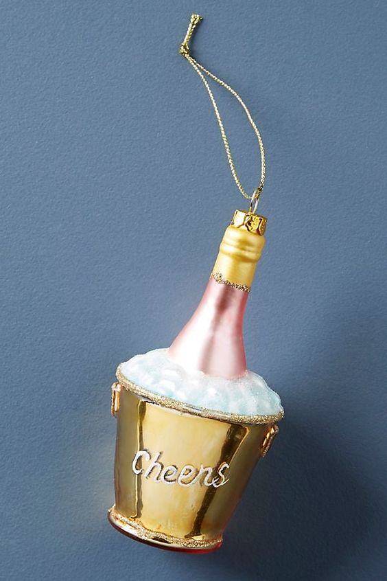 a champagne bucket ornament is a lovely idea for NYE parties, it's a lovely idea for stylign a glam Christmas tree