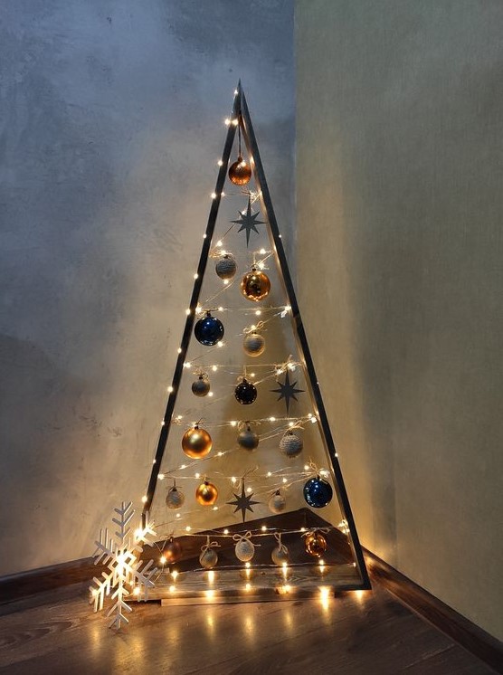 a frame Christmas tree with lights and various ornaments will be a beautiful alternative to a usual Christmas tree