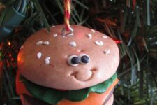 a funny cheeseburger Christmas ornament is a cool and bold idea for a Christmas tree, it’s pure fun