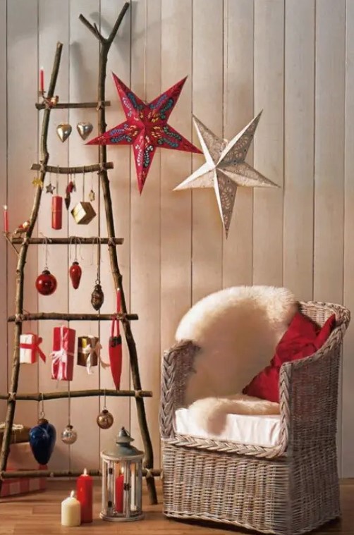 a ladder with various Christmas ornaments is a cute and very mobile Christmas decoration to go for