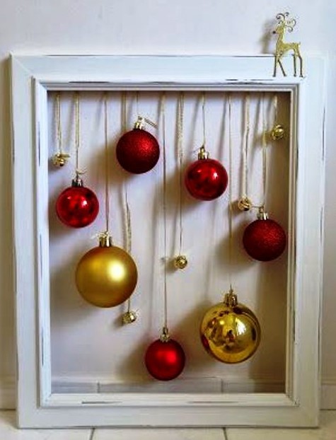 a lovely frame Christmas wreath with gold and red ornaments plus some bells is a simple and cool decoration