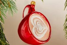 a red mug with latte and a heart on it is a cool idea for Christmas, it will warm you up visually