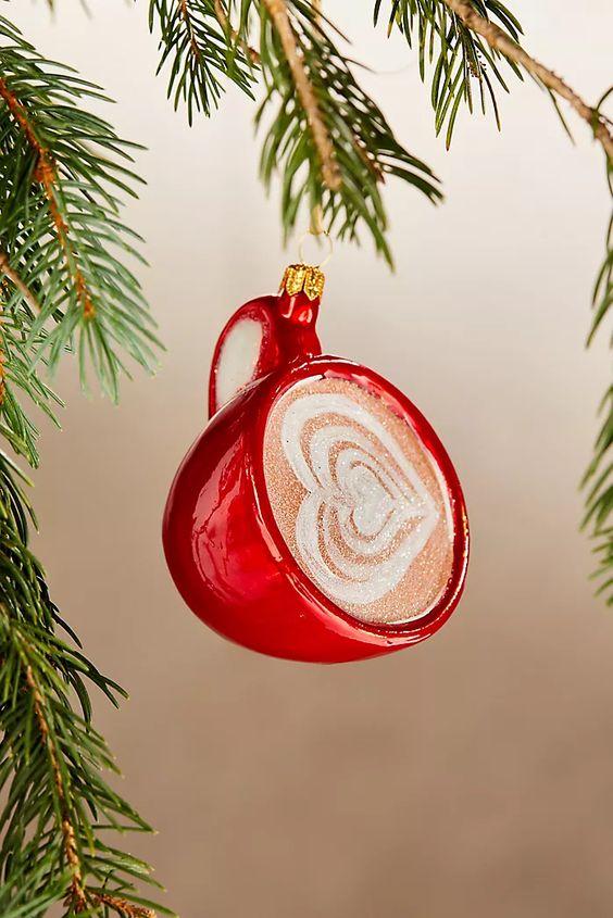 a red mug with latte and a heart on it is a cool idea for Christmas, it will warm you up visually