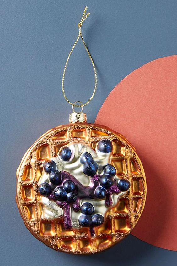 a waffle with cream and blueberries is a very unexpected solution for a Christmas tree, but who wants it boring anyway