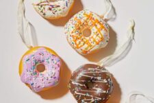an arrangement of glazed donuts is a fantastic Christmas tree decor idea to rock, they look delicious