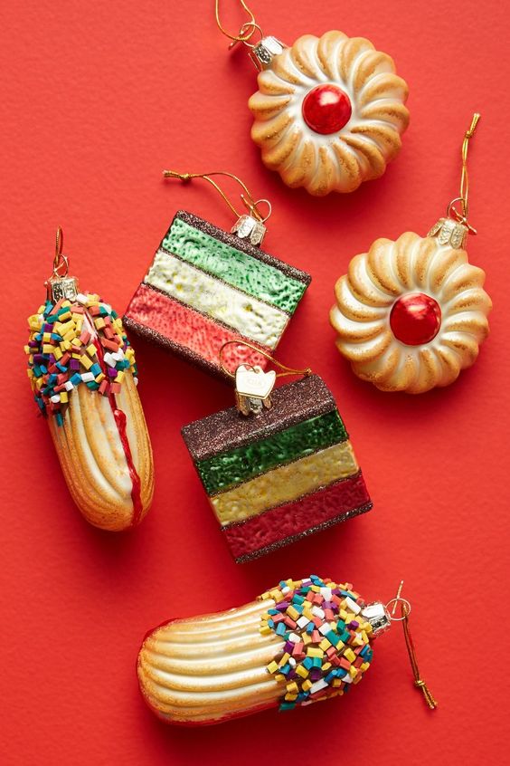 an assortment of bold cookies and cakies as Christmas ornaments is a lovely idea for a Christmas tree of a person with a sweet tooth