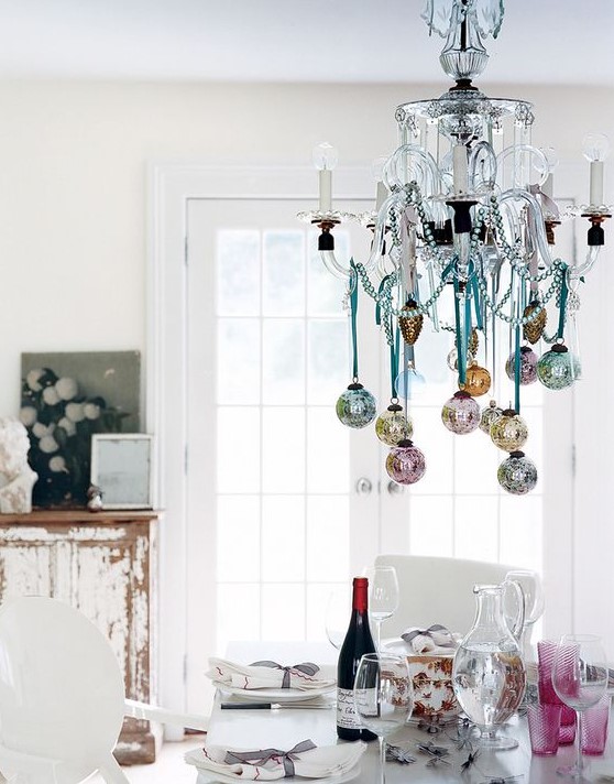 hang some pastel Christmas ornaments on yoru chandelier to make it cute and chic