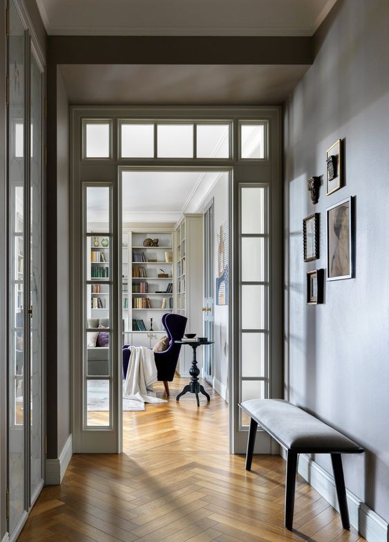 sidelights and a transom window without any door let natural light inside the entryway and make the space more welcoming