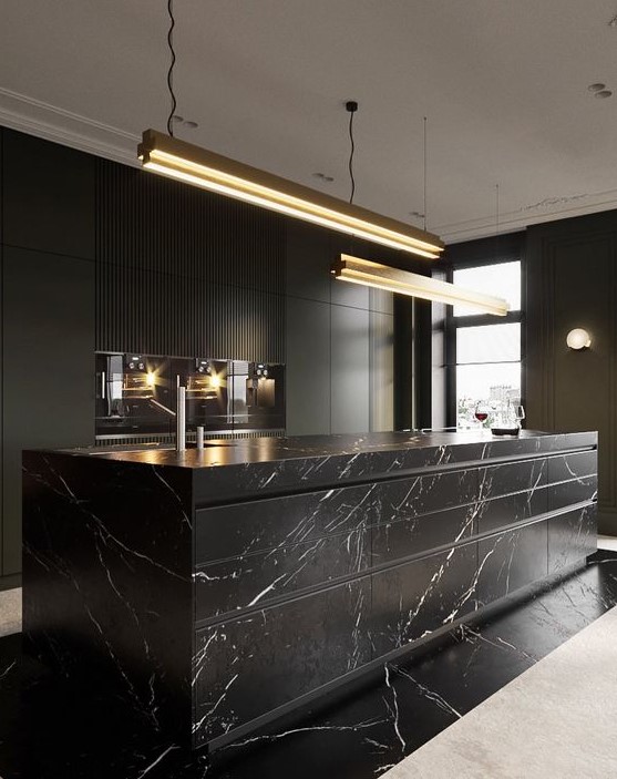 a luxurious black kitchen with sleek cabinets, built-in appliances, a large marble kitchen island and pendant lamps