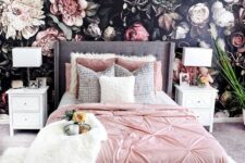 14 a realistic floral wallpaper wall, a grey bed with pink bedding, white inlay nightstands and a chic crystal flower chandelier
