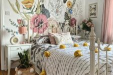 15 a teenage bedroom with a floral wall, a white metal bed, printed bedding, blush curtains, a cool chandelier and a plant in a basket