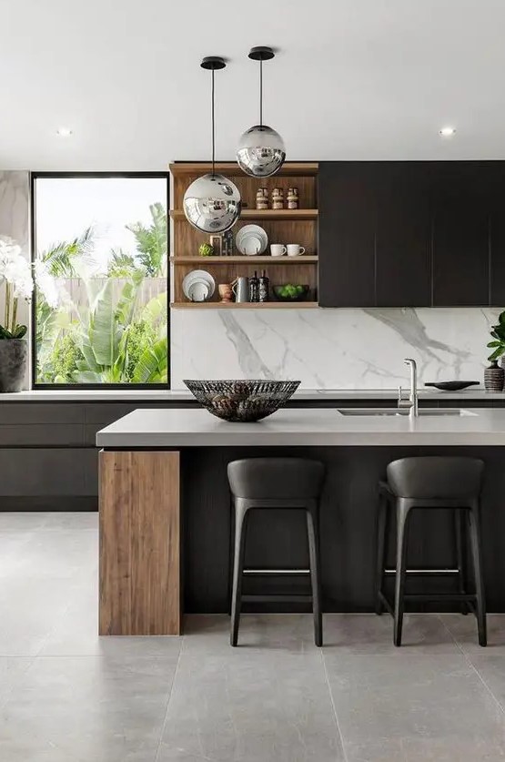 a super refined contemporary kitchen with sleek black cabinets, stained wood elements, white stone coutnertops and a backsplash
