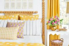 39 bold yellow curtains, polka dot pillows and a matching bedspread for a springy bedroom