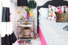 50 a glam and bold bedroom with a black and pink bed, polka dot, leopard and floral prints, polka dots on the wall and striped curtains