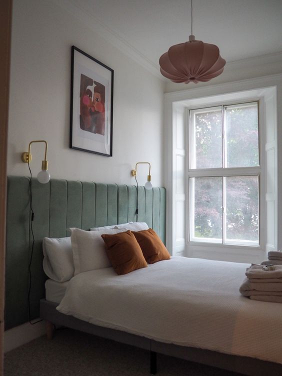 an upholstered full wall green headboard is a lovely accessory for the bedroom, and you can make one yourself