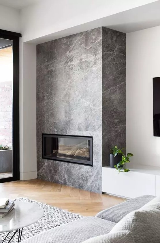 a modern Scandi living room design with a fireplace