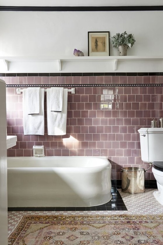 a bathroom with lilac tiles looks very soothing and welcoming, it's a great color for relaxation