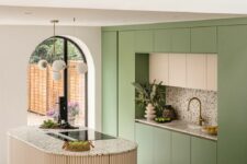 a cute kitchen with terrazzo accents