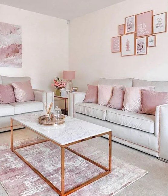 a delicate and lovely girlish living room with neutral seating furniture, pink pillows, a pink gallery wall, a coffee table and a pink rug
