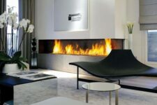 a modern minimalist fireplace fits any contemporary living room