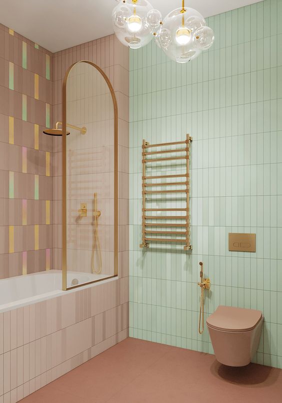 ديكورات حمامات حديثة A-pastel-bathroom-with-a-green-and-mauve-skinny-tile-wall-a-mauve-floor-and-a-toilet-brass-fixtures