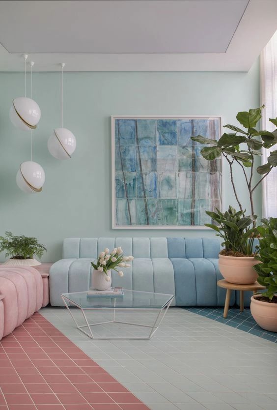  غرف معيشة بألوان الباستيل  A-pastel-living-room-with-mint-blue-walls-a-color-block-floor-a-color-block-blue-sofa-a-pink-daybed-pendant-lamps