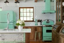 a mint fridge, a cooker and a hood give this rustic kitchen a retro feel and make it look bolder and fresher