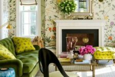 14 a vintage living room with floral wallpaper, a green sofa and yellow pillows, a coffee table and a yellow chair