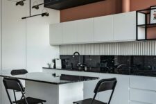 a modern kitchen with a practical kitchen island