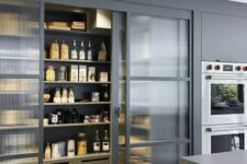 a practical pantry behind a glass door
