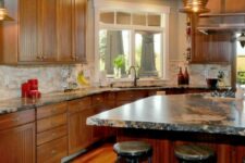 a classic kitchen with stained cabinets