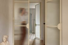 refined beige frame fluted glass doors with curved touches perfectly finish off the space and make it refined and beautiful
