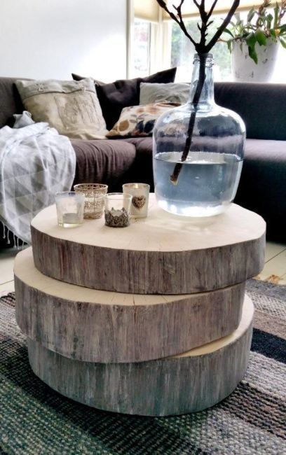 a creative yet simple tree slice stacked coffee table is a perfect rustic home decor piece that can be easily DIYed