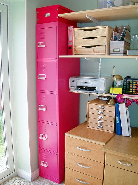a functional home office with stained drawers and cabinets, a row of bold pink lockers is a lovely idea for a touch of color