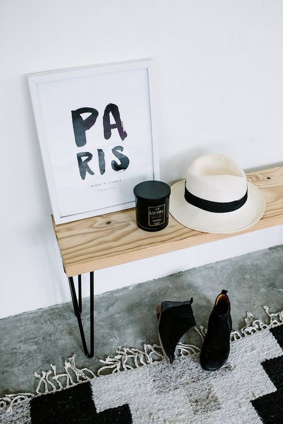 a stained bench with black hairpin legs is a perfect idea for a mid-century modern entryway or mudroom
