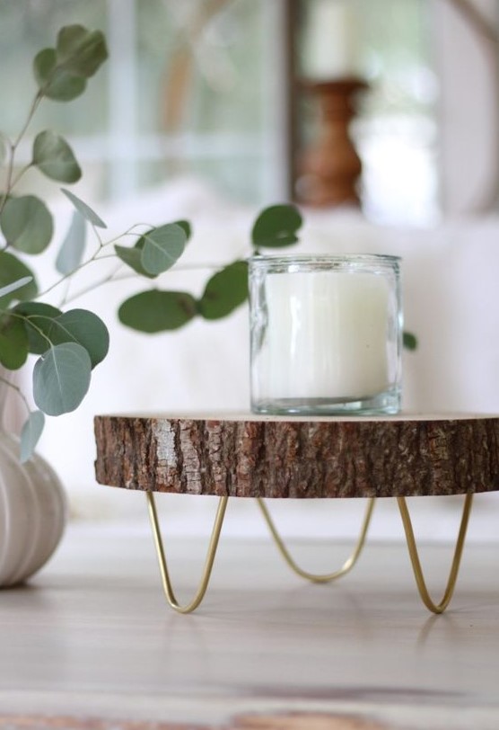 a footed wood slice tray or a cake stand with hairpin legs is a lovely rustic decor idea, you can DIY it easily