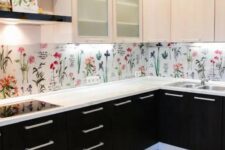 09 a monochromatic kitchen receives a bold floral print and more interest with it with a wallpaper backsplash