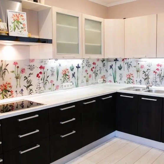 a monochromatic kitchen receives a bold floral print and more interest with it with a wallpaper backsplash