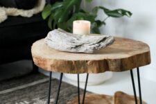 13 a rustic side table of a tree slice and black hairpin legs is a lovely rustic piece or a plant stand if you need one